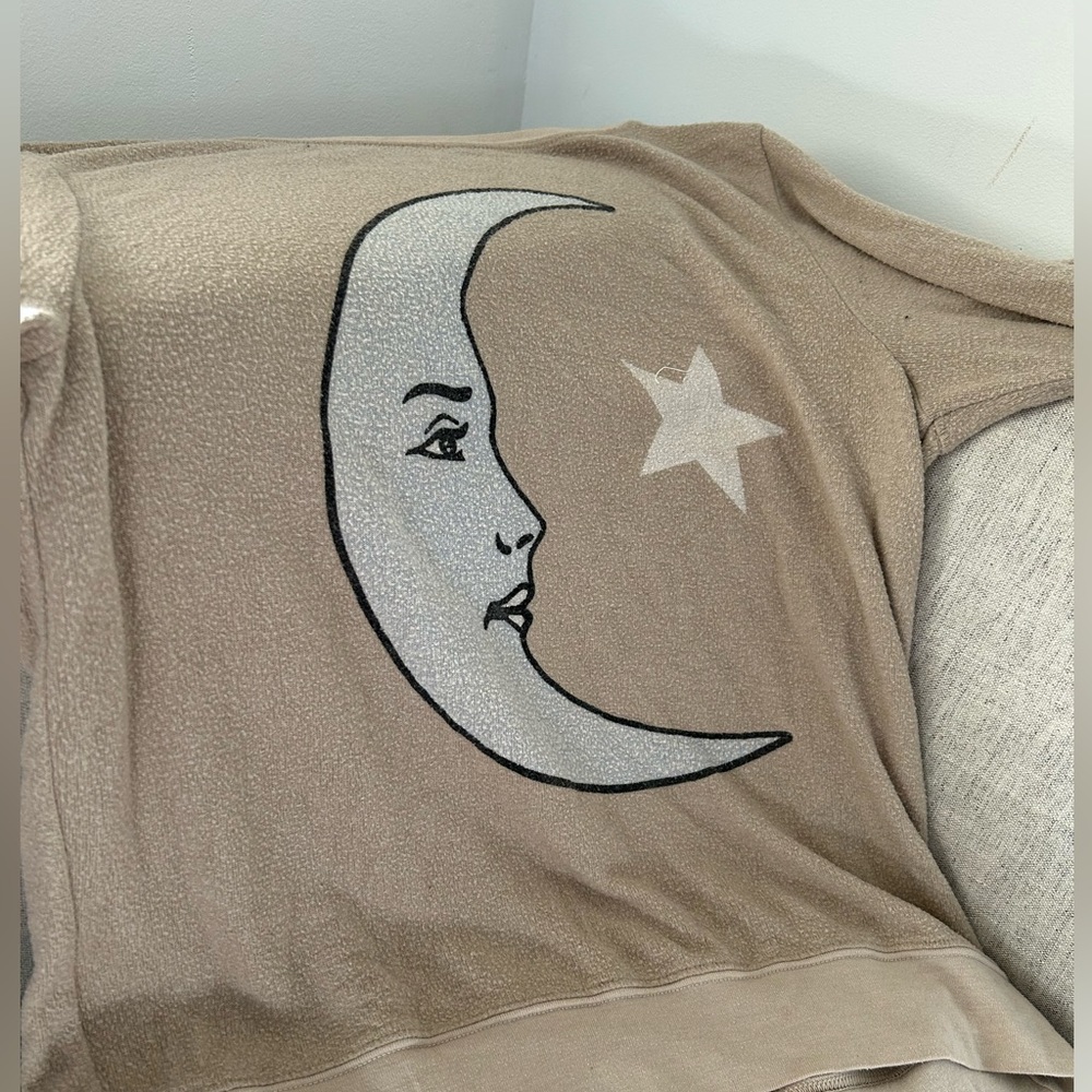 Oversized.Moon +star sweater.Used.Colors have faded a bit, small but runs big